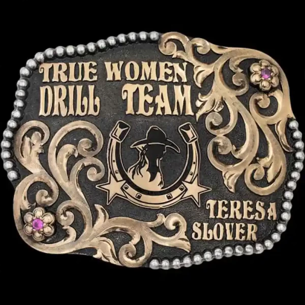 "Our Carson City Belt Buckle is a true beauty. Handcrafted on a German Silver base, it features a beaded edge and Western-inspired scrollwork flowing from the top right and lower left corner toward the center. This design is full of fine  details, in